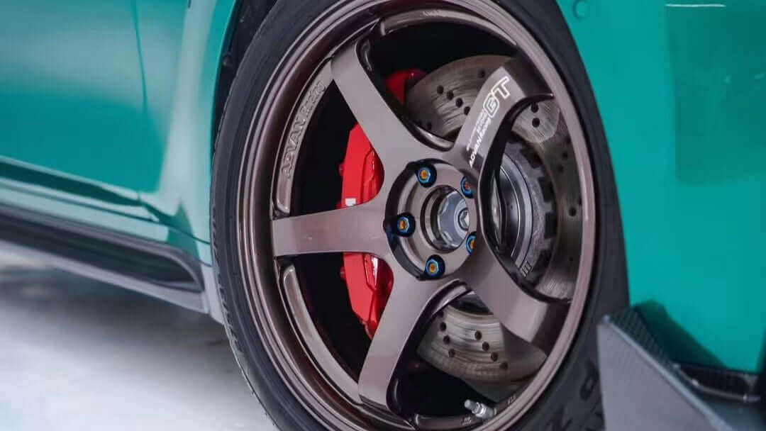 BMW M3 Compeition install Aumotor titanium lug bolts right wheel image 