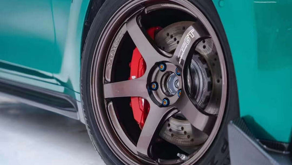 BMW M3 Compeition install Aumotor titanium lug bolts right wheel image 