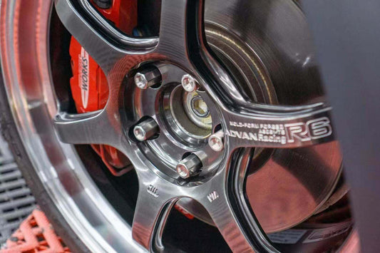 aumotor's product titanium lug bolts intsall on Mini Cooper, the rim is ADVANR6