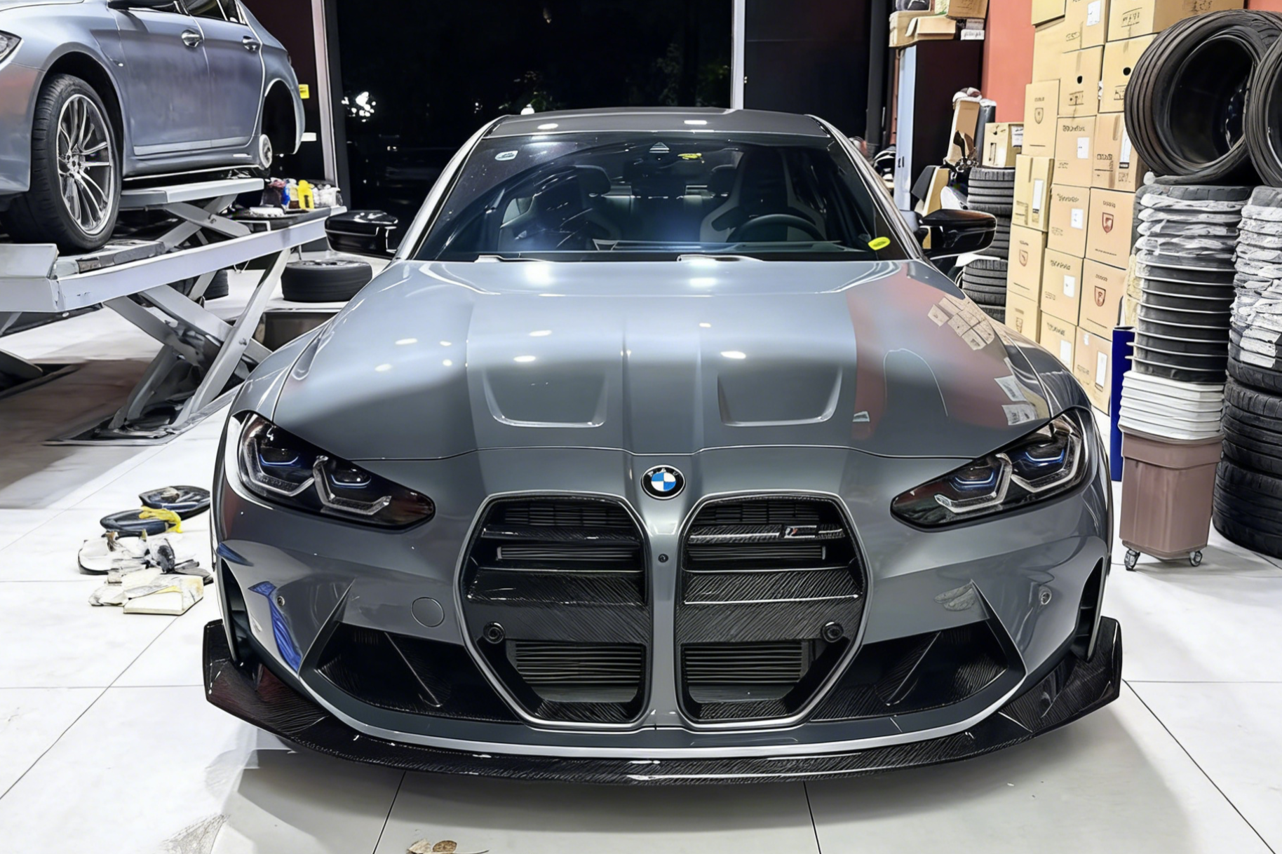 front side of BMW M4 after installation of dry carbon fiver front bumper lip CSL  style body kit customer feedback