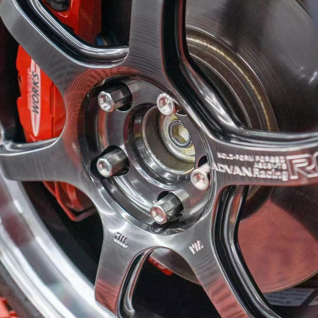 Close-up of a high-performance bmw wheel with 'Rovan Racing' branding. after the installation of bmw wheel lug bolts